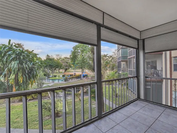 a view of a street from a balcony