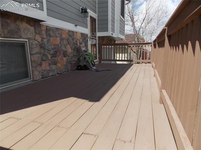 6375 Bismark Road Colorado Springs, CO 80922 - Photo 3 of 24 Tiger wood deck.