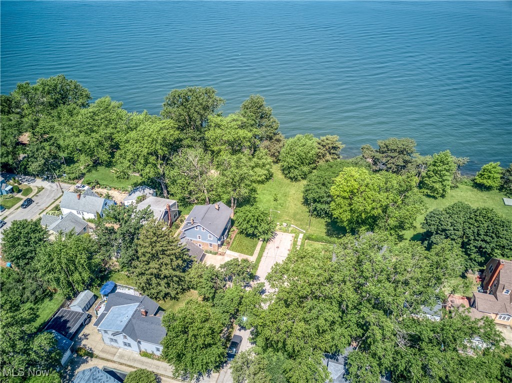 17728 Windward Road Cleveland, OH 44119 - Photo 9 of 32 Aerial view of property and surrounding area featuring nearby suburban area and a large body of water
