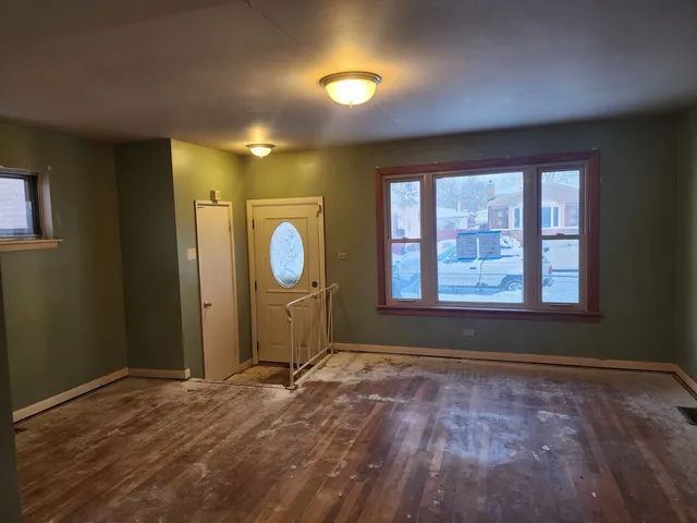 a view of an empty room and window