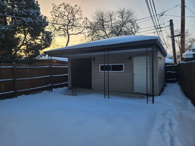 a view of an empty room with a fireplace