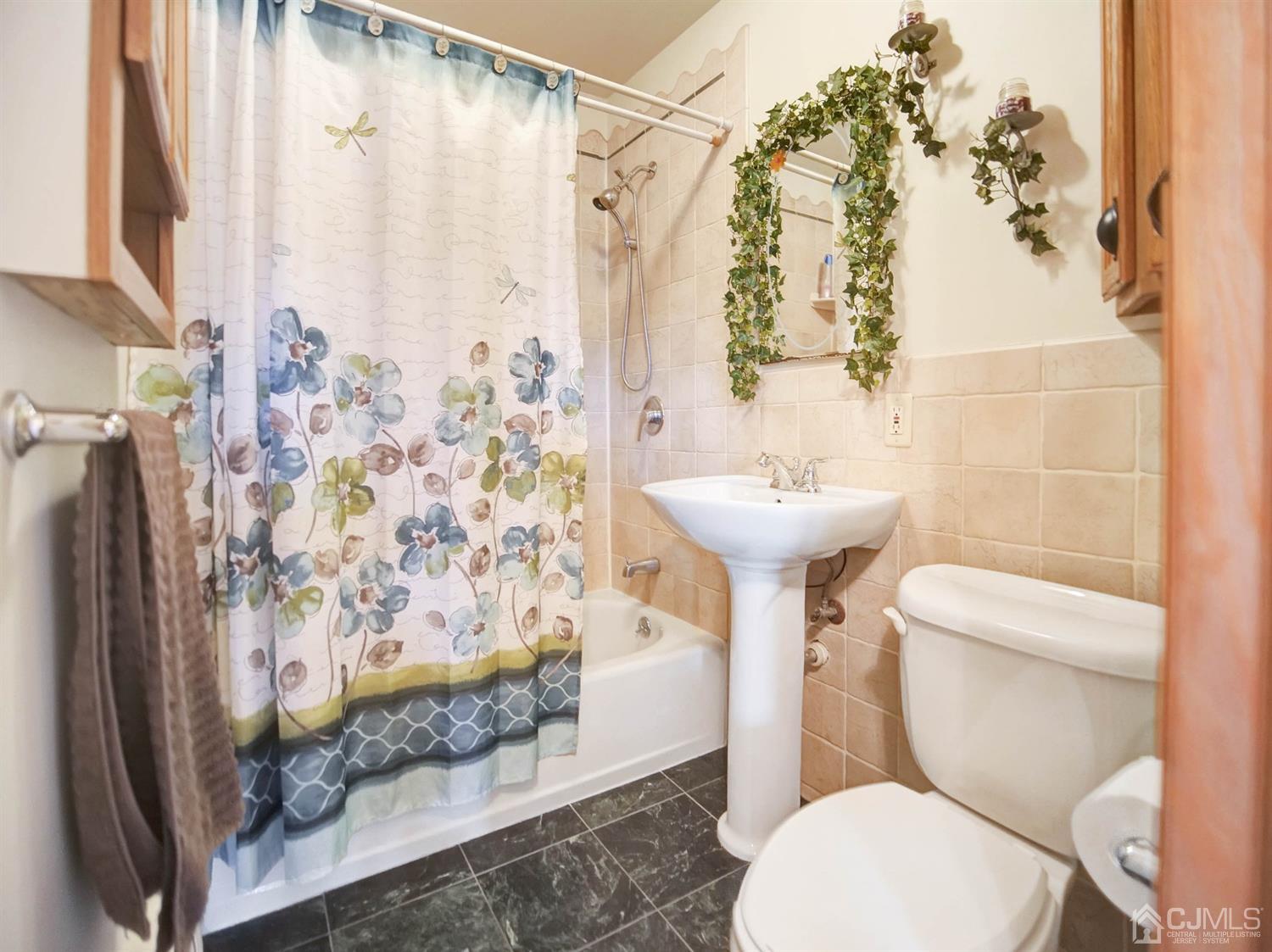 21 Crescent Road Edison, NJ 08817 - Photo 13 of 38 a bathroom with a sink toilet and shower