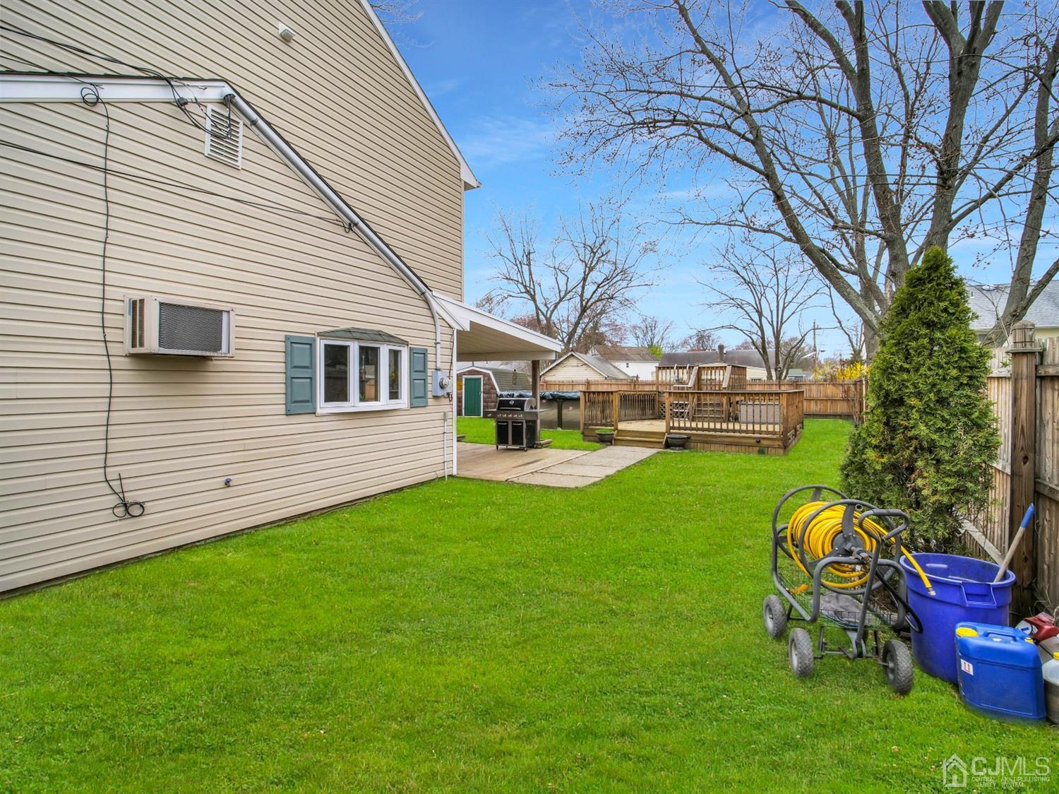 21 Crescent Road Edison, NJ 08817 - Photo 22 of 38 a view of a house with a backyard