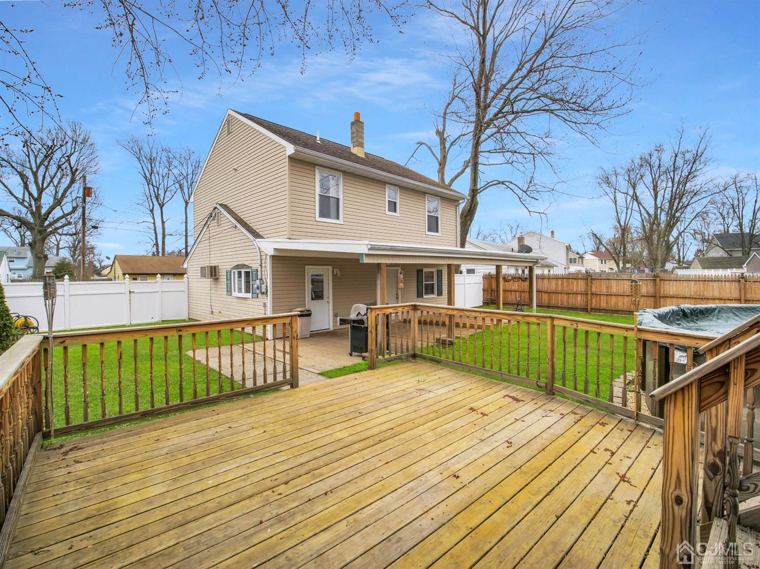 21 Crescent Road Edison, NJ 08817 - Photo 26 of 38 a view of a house with a wooden deck