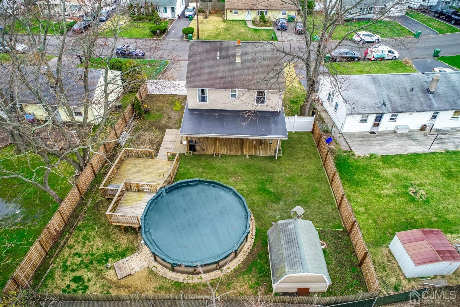 21 Crescent Road Edison, NJ 08817 - Photo 29 of 38 an aerial view of a house with backyard space and swimming pool