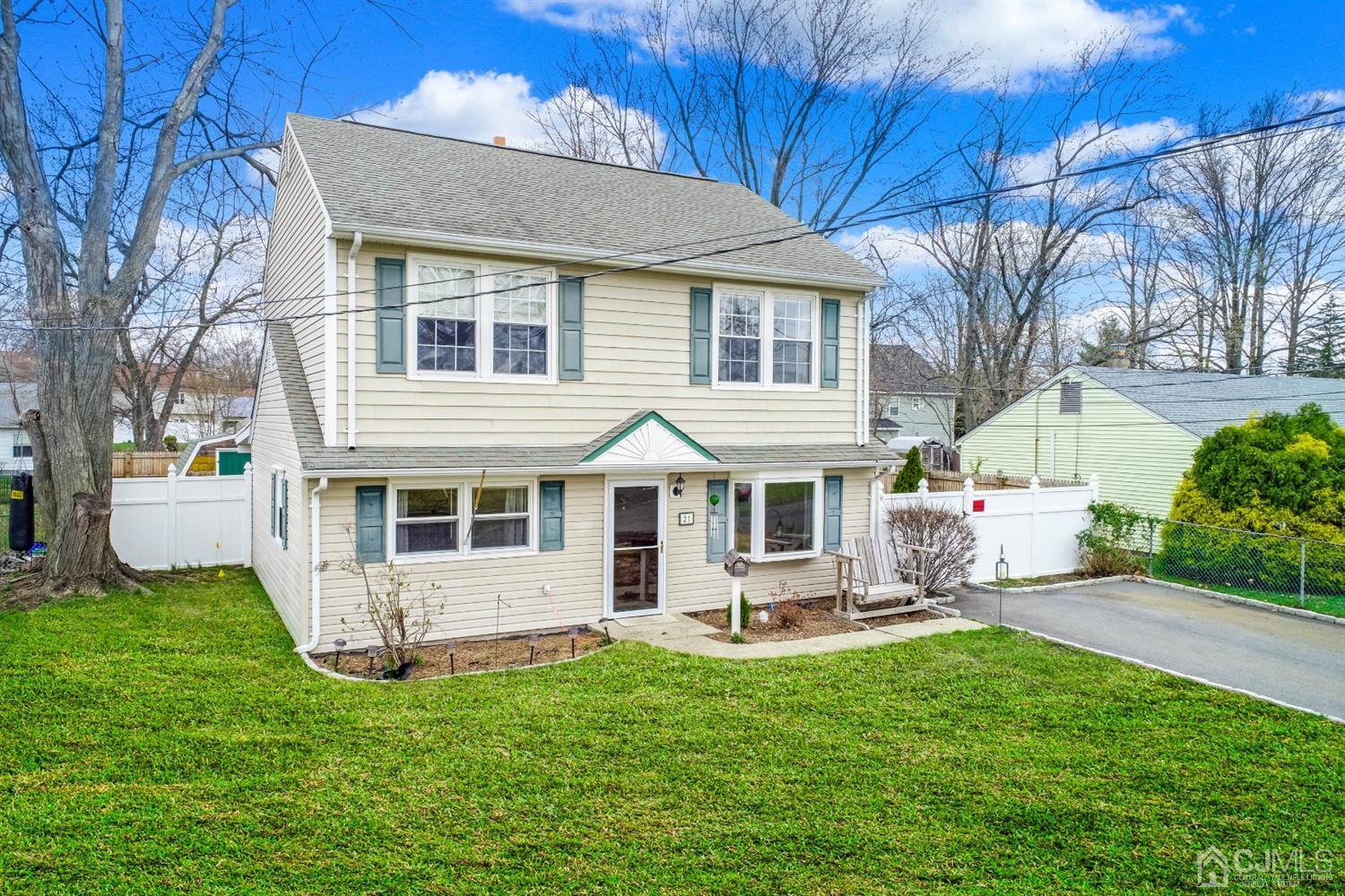 21 Crescent Road Edison, NJ 08817 - Photo 38 of 38 a front view of a house with a garden and trees