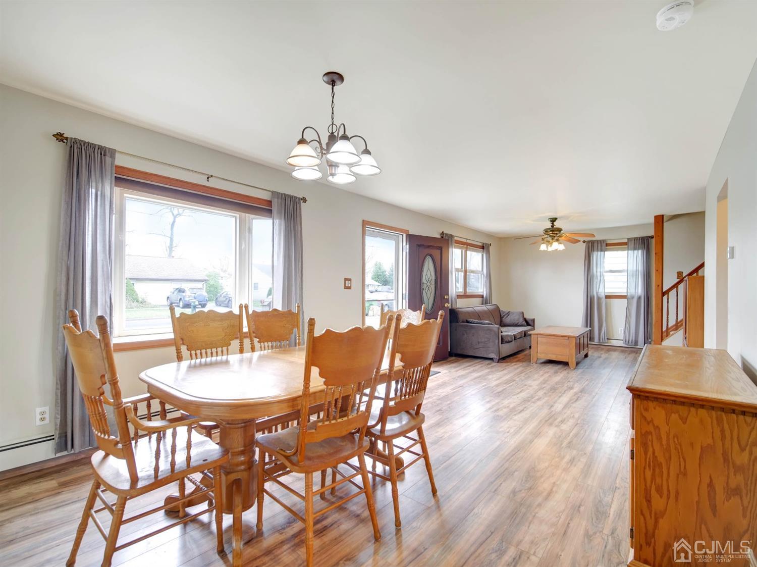 21 Crescent Road Edison, NJ 08817 - Photo 5 of 38 a view of a dining room with furniture wooden floor and chandelier