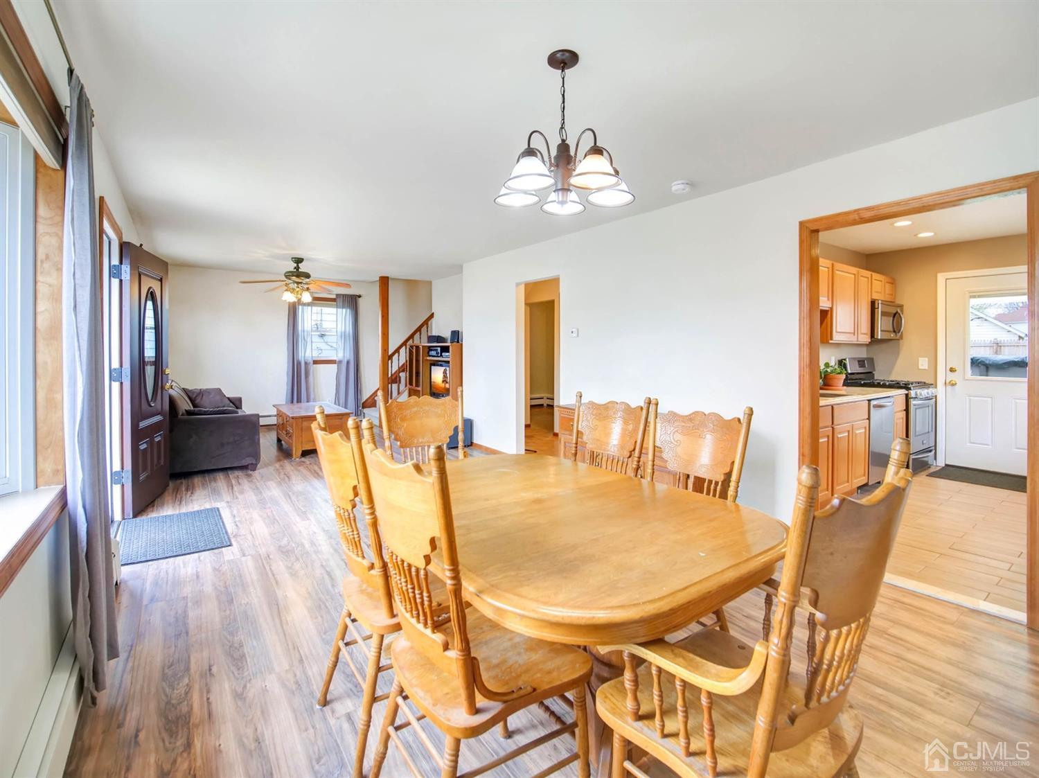 21 Crescent Road Edison, NJ 08817 - Photo 6 of 38 a view of a dining room with furniture and wooden floor