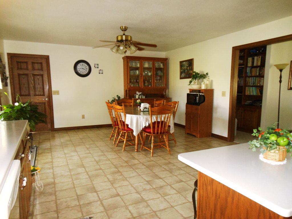 214 Hotel Road Flintville, TN 37335 - Photo 12 of 18 a view of a dining room with furniture and chandelier