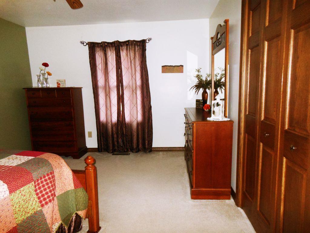 214 Hotel Road Flintville, TN 37335 - Photo 16 of 18 a bed room with a bed and a closet