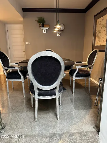 a view of a dining room with furniture