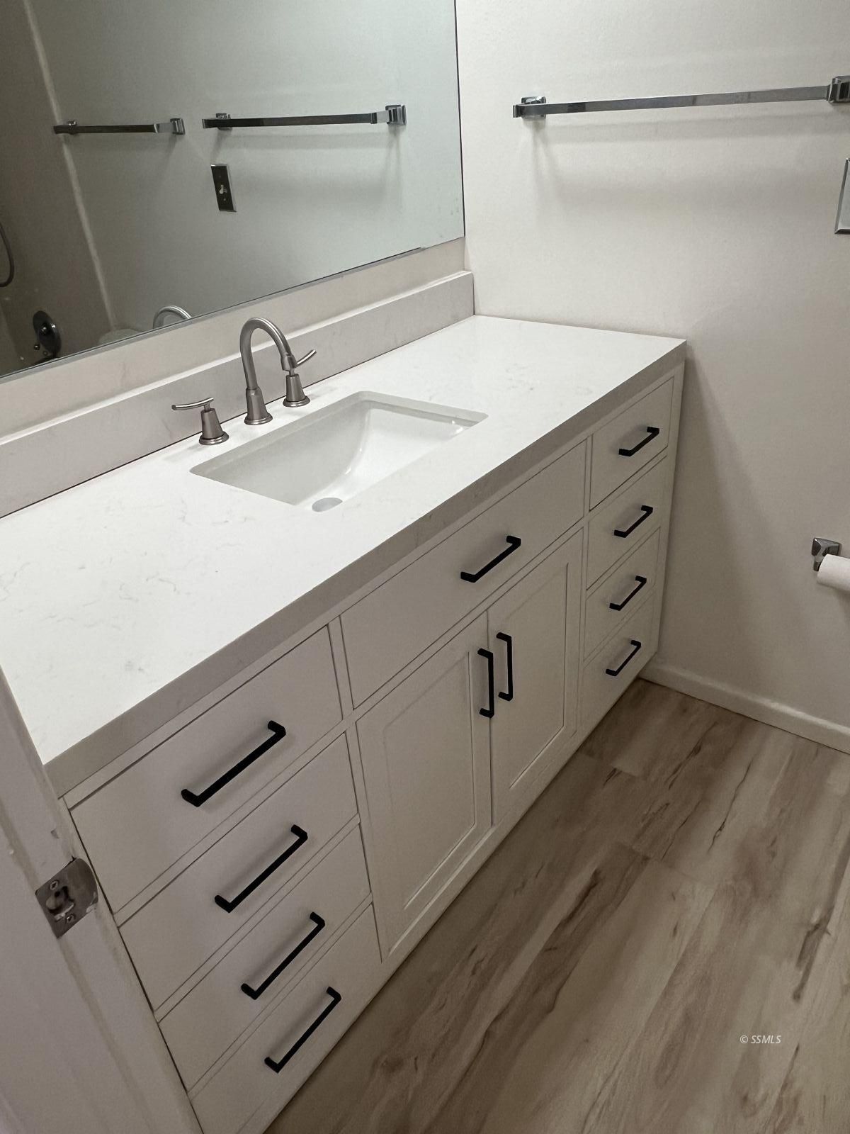 209 South Gold Canyon Street Ridgecrest, CA 93555 - Photo 20 of 33 a bathroom with a sink and a mirror