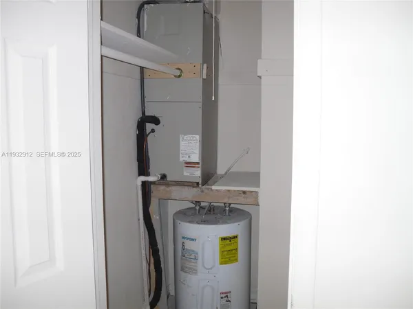 a close view of a closet with wooden floor