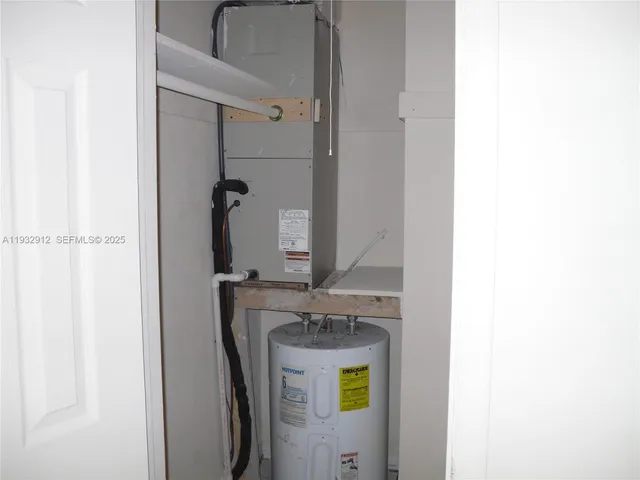 a close view of a closet with wooden floor