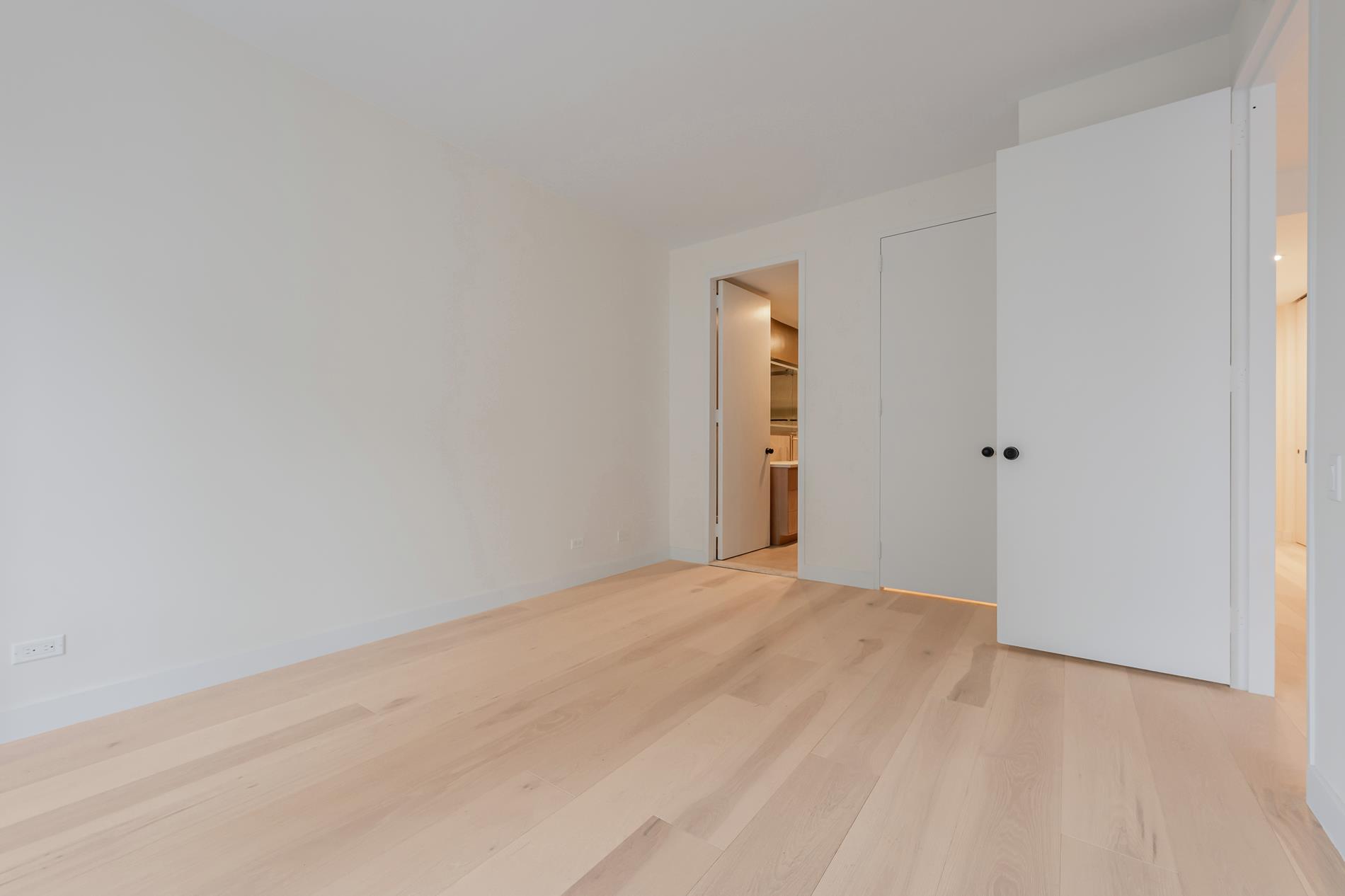 146 West 57th Street, Unit 52E Manhattan, NY 10019 - Photo 10 of 19 a view of an empty room