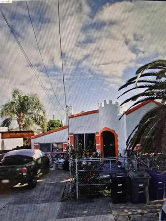 a view of a car parked in front of a building
