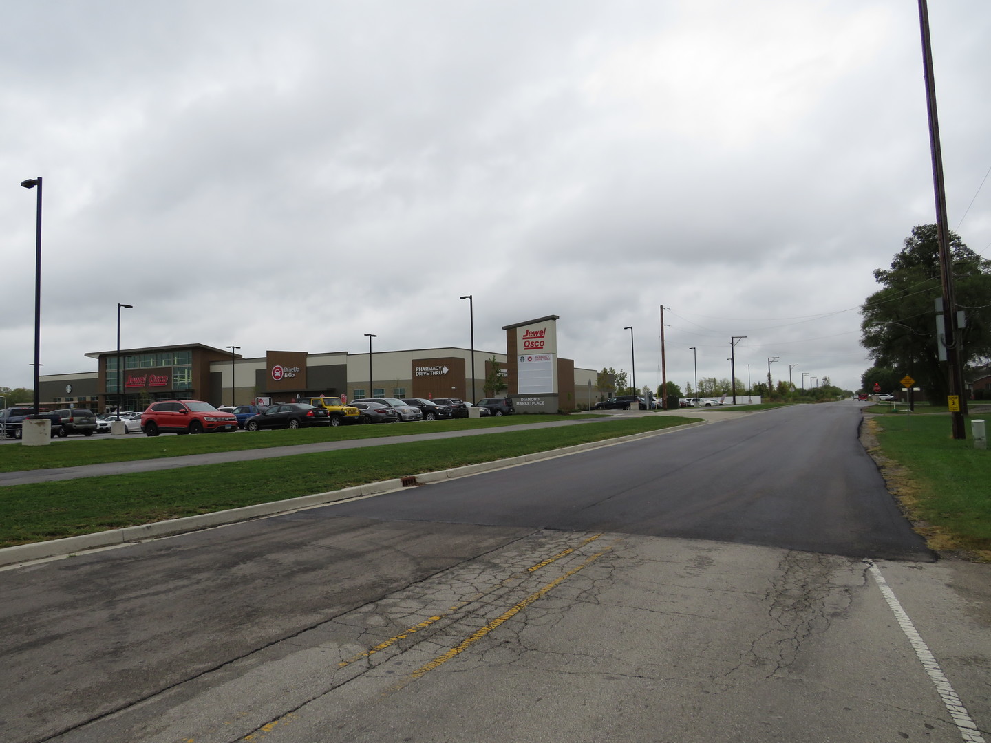 70 South Will Road Diamond, IL 60416 - Photo 6 of 7 a view of a city street with a large building