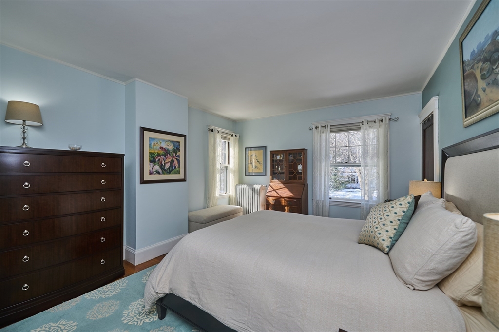 132 Windermere Road Auburndale, MA 02466 - Photo 15 of 38 a bedroom with a bed and a dresser