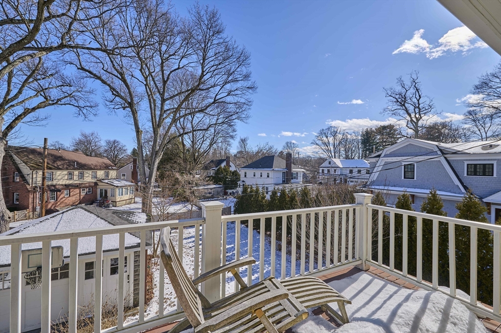 132 Windermere Road Auburndale, MA 02466 - Photo 23 of 38 a view of a brick house with a large window