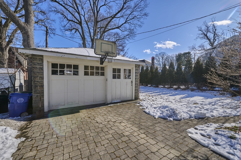 132 Windermere Road Auburndale, MA 02466 - Photo 3 of 38 a front view of a house with a yard