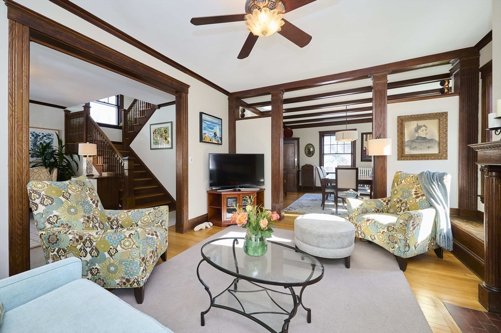 132 Windermere Road Auburndale, MA 02466 - Photo 7 of 38 a living room with furniture and a flat screen tv