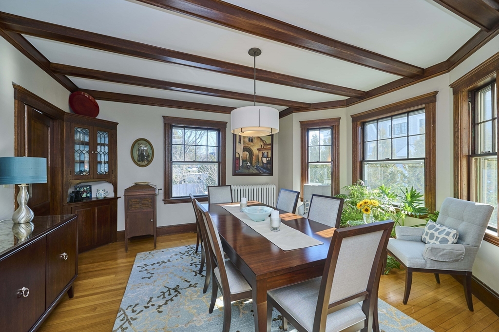 132 Windermere Road Auburndale, MA 02466 - Photo 9 of 38 a dining room with furniture a rug and a large window
