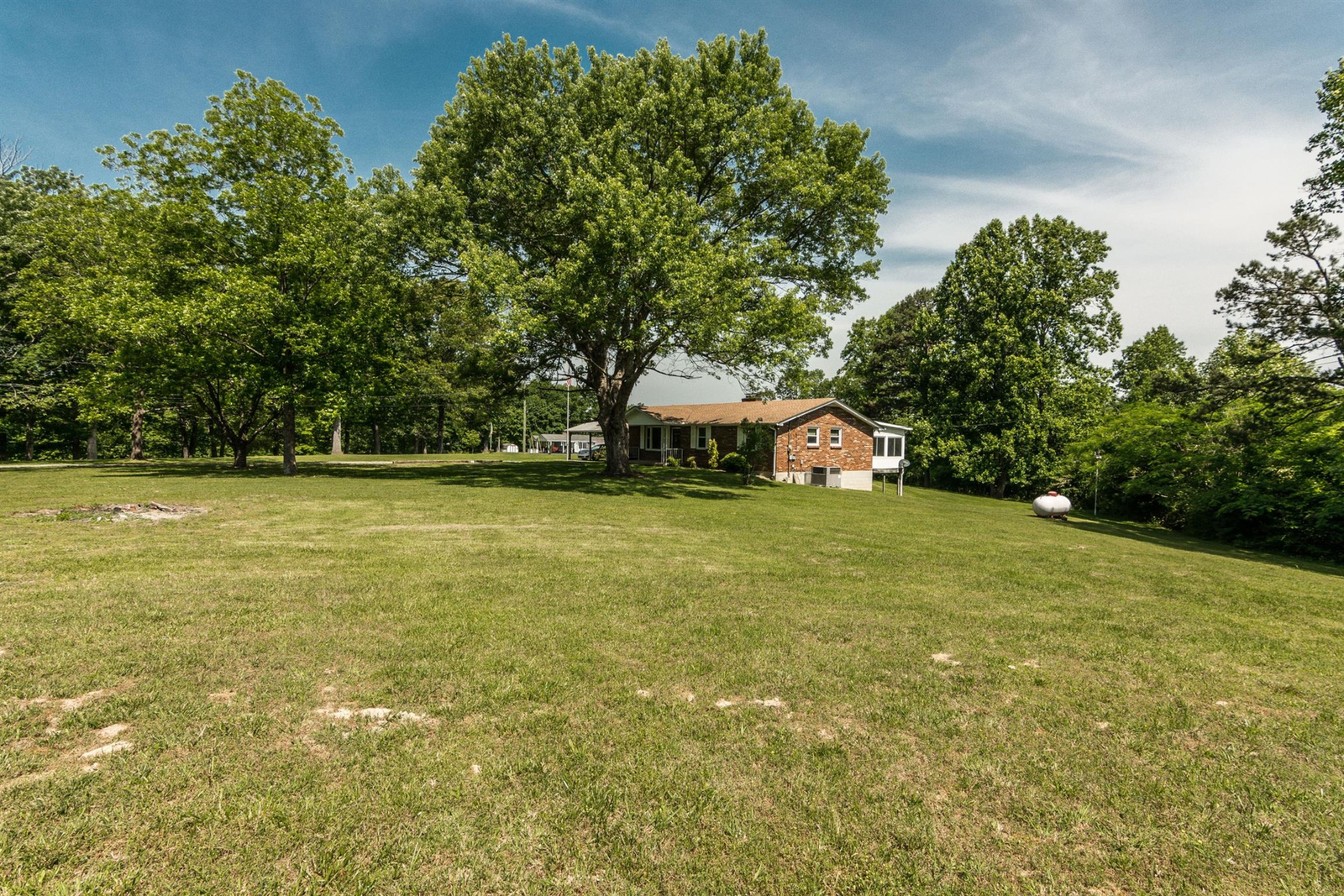 5124 Ridge Hill Road Joelton, TN 37080 - Photo 21 of 27 a yellow building in the middle of a yard