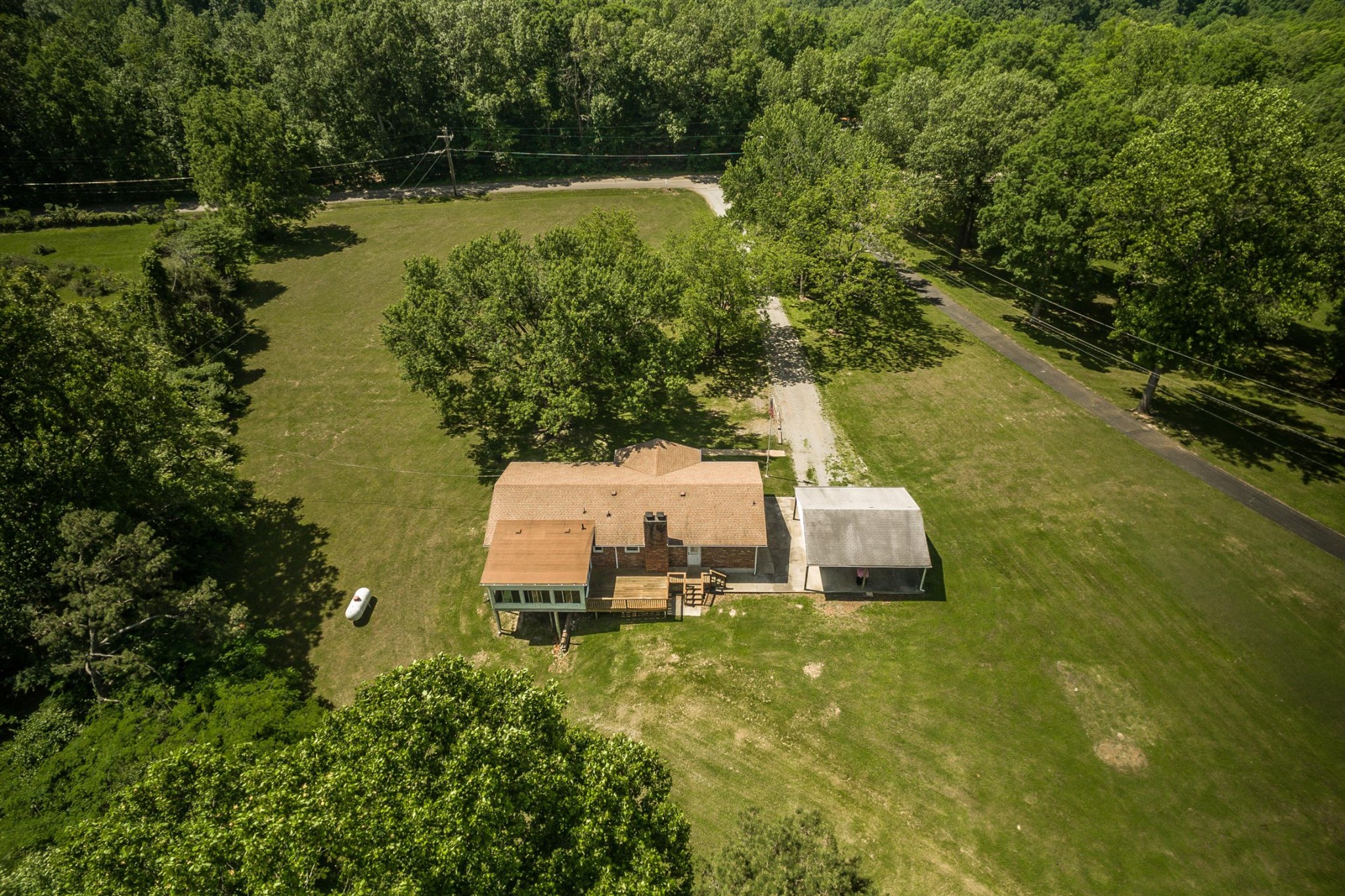 5124 Ridge Hill Road Joelton, TN 37080 - Photo 22 of 27 a house view with a lake