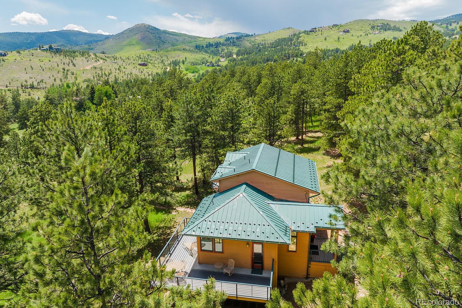 498 Mountain Meadows Road Boulder, CO 80302 - Photo 36 of 40 view of a house with a yard