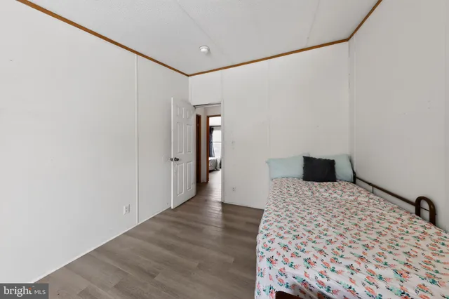 a bedroom with a bed and a cabinets