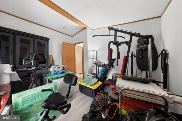 a living room with lots of furniture and a rug