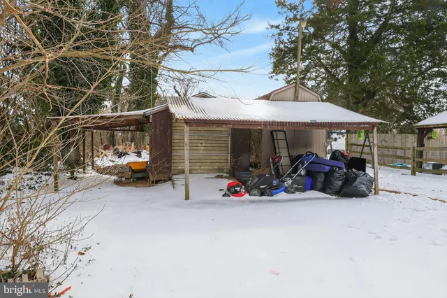 a view of road with card and car parked