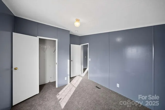 a view of a room with an empty space