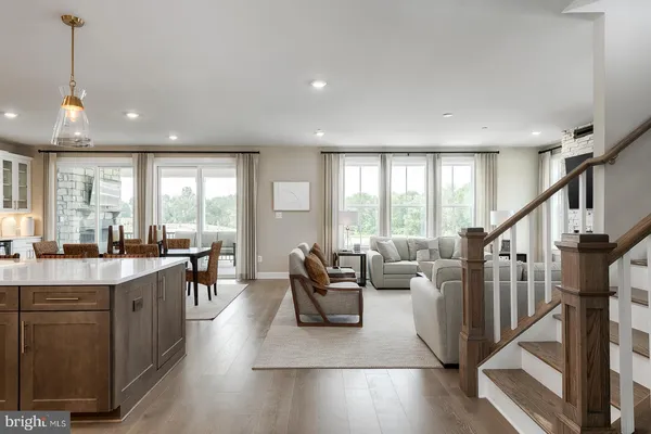 a work room with furniture and wooden floor