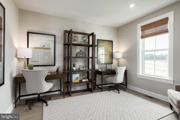 a view of living room and kitchen