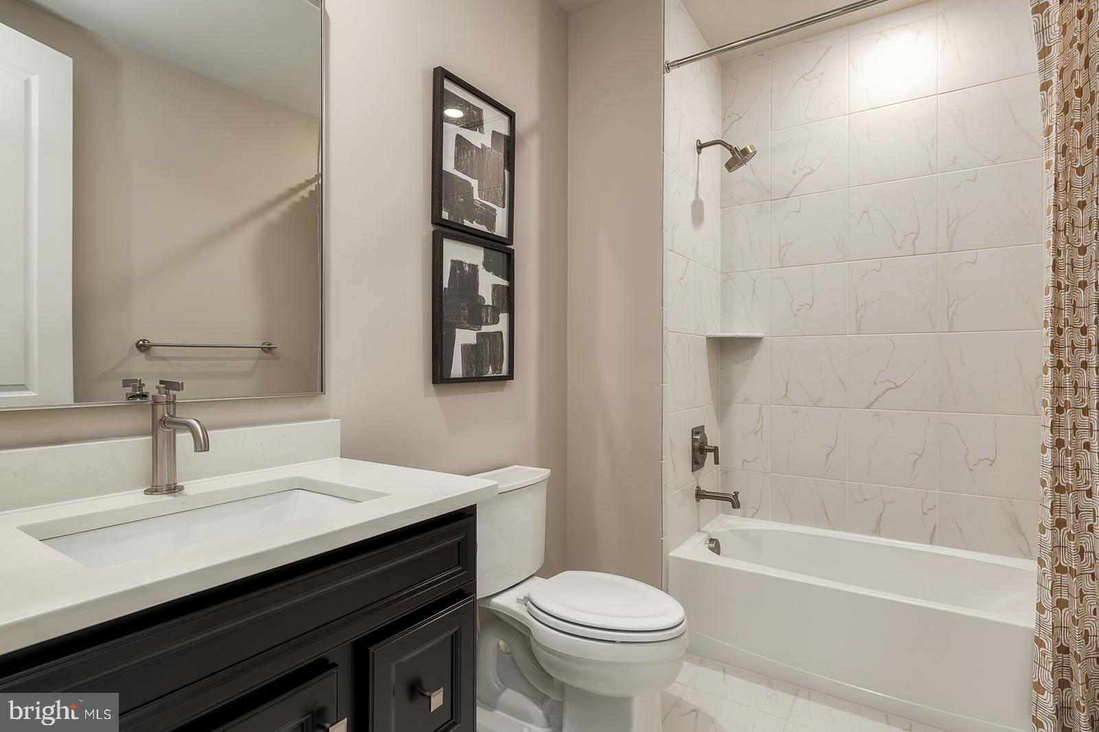 3100 Brazier Lane Exton, PA 19341 - Photo 20 of 35 a bathroom with a sink a toilet and shower