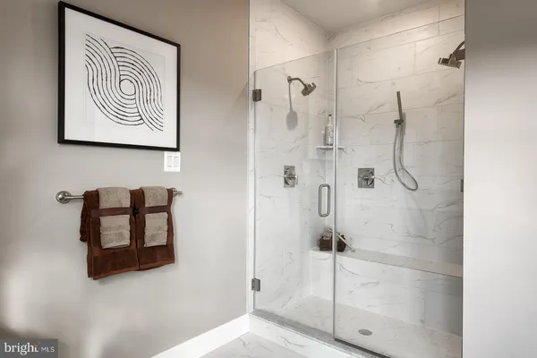 a utility room with sink dryer and washer
