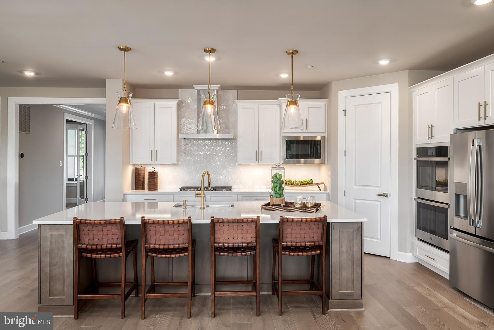 3100 Brazier Lane Exton, PA 19341 - Photo 5 of 35 a large kitchen with a table and chairs