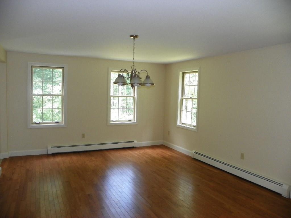 22 Durrell's Woods Road Arundel, ME 04046 - Photo 21 of 33 Formal dining room with hardwood...