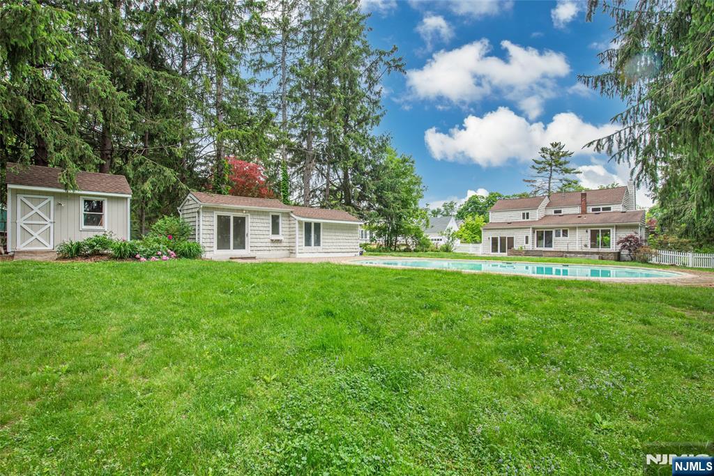 163 Sand Spring Road Morristown, NJ 07960 - Photo 28 of 39 a view of a house with a backyard