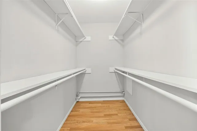 a view of an empty walk in closet