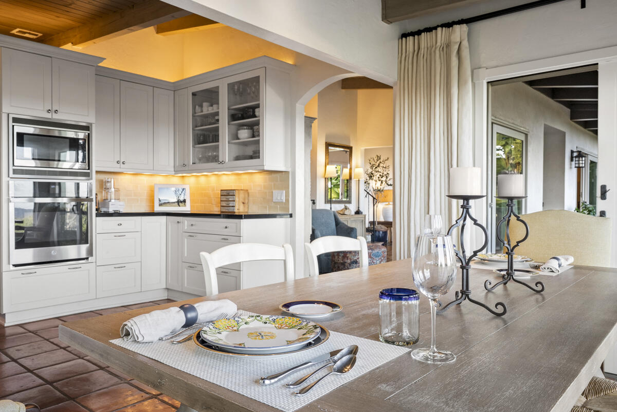 901 Cheltenham Road Santa Barbara, CA 93105 - Photo 7 of 27 a kitchen with a table and chairs in it