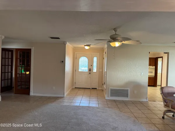 an empty room with a bathroom