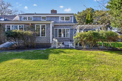 a house view with a garden space