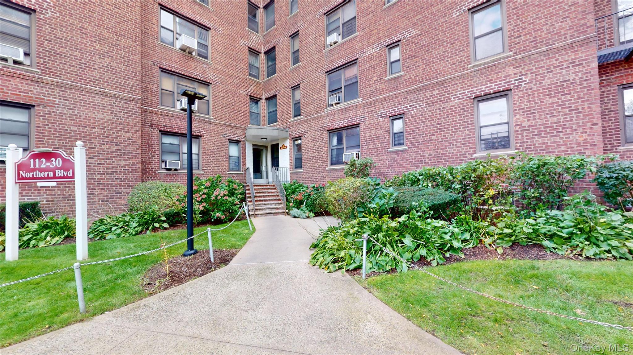 112-30 Northern Boulevard, Unit 4B Queens, NY 11368 - Photo 1 of 12 View of building exterior