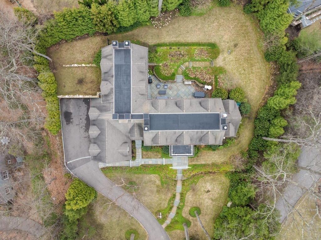 8 Glen Brook Road Wellesley, MA 02481 - Photo 31 of 32 an aerial view of a house with swimming pool and large trees