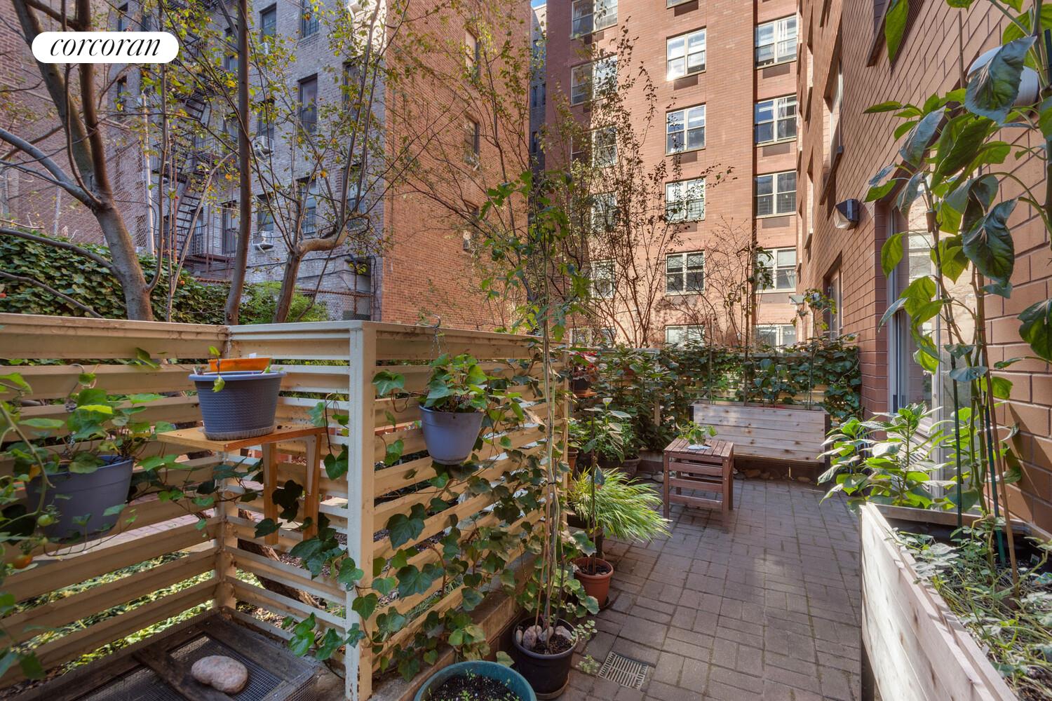 736 West 187th Street, Unit 108 Manhattan, NY 10033 - Photo 4 of 15 a view of a city with tall buildings