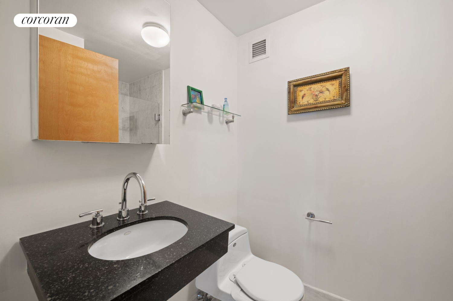 736 West 187th Street, Unit 108 Manhattan, NY 10033 - Photo 9 of 15 a bathroom with a granite countertop sink and a mirror