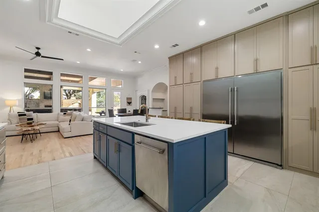 a kitchen with counter top space and appliances