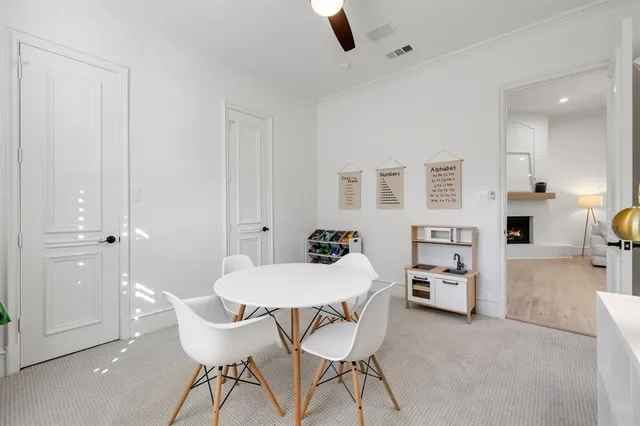 a bedroom with furniture and a chandelier